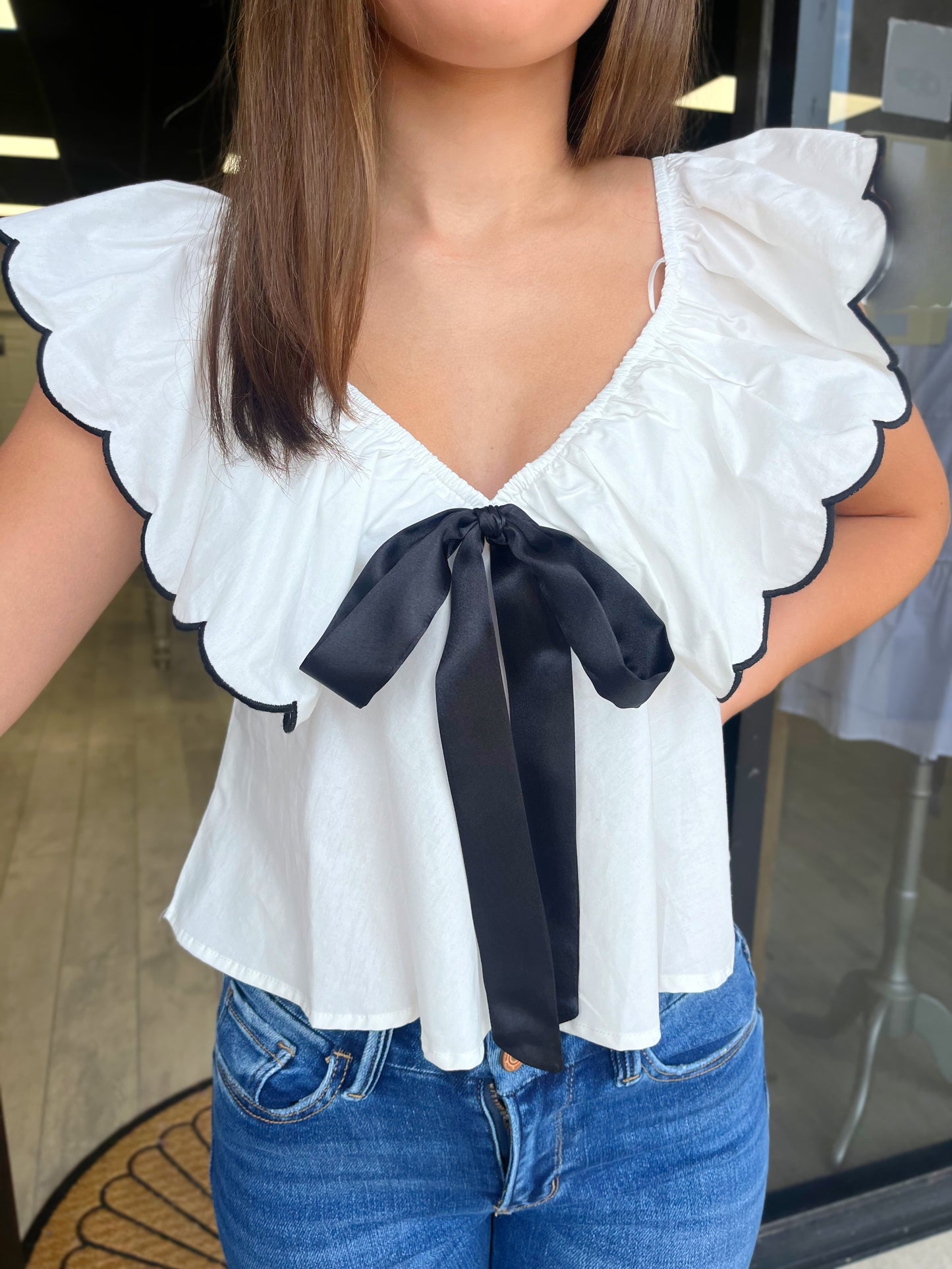 Winning in White Bow Top